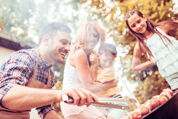 Happy family having a barbecue